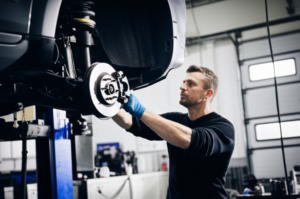 Professional mechanic performing suspension repair work at Hyperion Auto Repair in Los Angeles