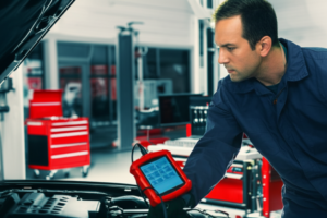 Professional mechanic performing transmission diagnostic service at Hyperion Auto Repair in Los Angeles