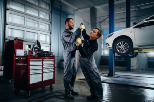 Auto body technician performing collision repair at professional shop in Eagle Rock area